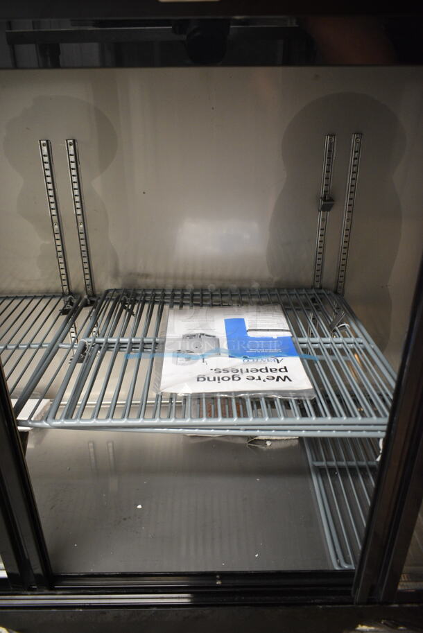 BRAND NEW SCRATCH AND DENT! 2024 Avantco 178UBB72SHC 73" Black Counter Height Narrow Sliding Glass Door Back Bar Refrigerator with LED Lighting. 115 Volts, 1 Phase. Tested and Working!
 - Image 7 of 9