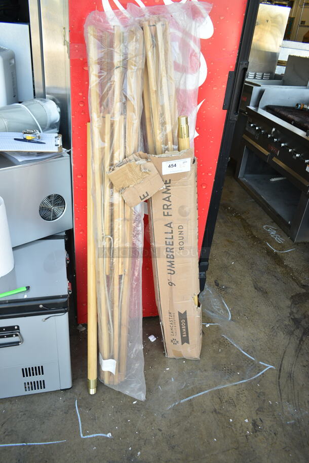 2 BRAND NEW SCRATCH AND DENT! Lancaster Table & Seating Wooden 9' Round Umbrella Frames. 2 Times Your Bid! - Image 1 of 4