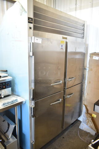 Traulsen G20000 Stainless Steel Commercial 4 Half Size Door Reach In Cooler on Commercial Casters. 115 Volts, 1 Phase. Tested and Powers On But Does Not Get Cold