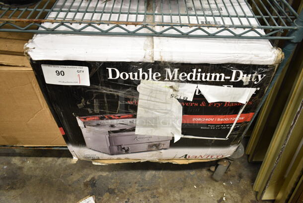 BRAND NEW SCRATCH AND DENT! 2023 Avantco 177F202 Stainless Steel Commercial Countertop Electric Powered 2 Bay Fryer w/ Lids and Metal Fry Baskets. 208-240 Volts, 1 Phase. - Image 2 of 3