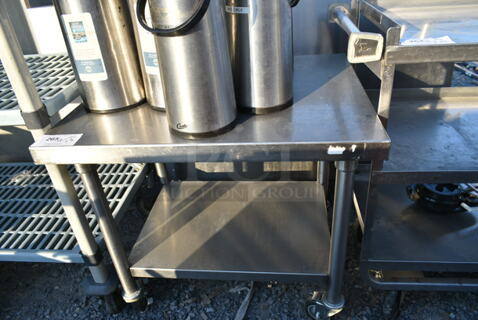 Stainless Steel Table w/ Under Shelf on Commercial Casters. 