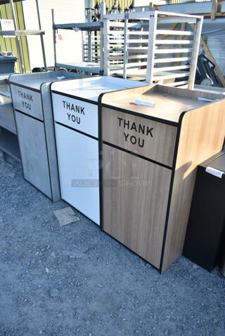 3 BRAND NEW SCRATCH AND DENT! Items; Lancaster Table & Seating Waste 35 Gallon Weathered Walnut Receptacle Enclosure with "THANK YOU" Swing Door, Lancaster Table & Seating Waste 35 Gallon White Receptacle Enclosure with "THANK YOU" Swing Door, Lancaster Table & Seating Waste 35 Gallon Concrete Receptacle Enclosure with "THANK YOU" Swing Door. 3 Times Your Bid!