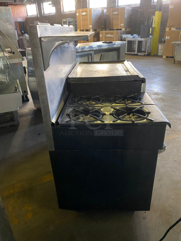 Commercial Natural Gas Powered 4 Burner Stove! With Built In Flat Top Grill! With Back Splash And Salamander Shelf! With Full Size Oven! Metal Oven Rack! With 2 Door Storage Area Underneath! All Stainless Steel! - Image 3 of 12