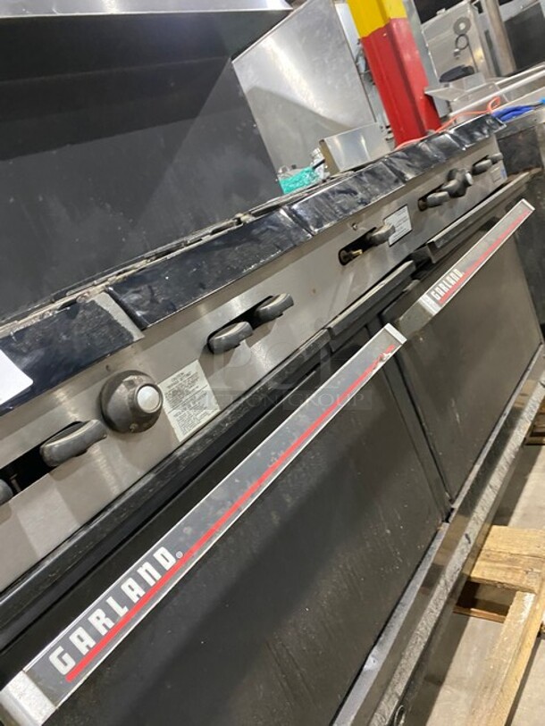 Garland Stainless Steel Commercial Natural Gas Powered 10 Burner Stove! With 2 Full-Sized Ovens! With Metal Oven Racks! With Raised Back Splash & Salamander Shelf! - Image 9 of 10