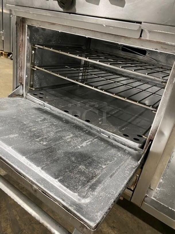 Garland Commercial Gas Powered 8 Burner Stove! With Raised Back Splash And Salamander! With Oven Underneath! All Stainless Steel! On Casters! - Image 7 of 11