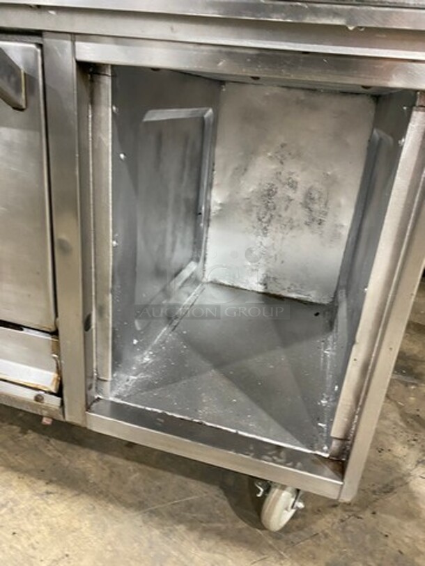 Garland Commercial Gas Powered 8 Burner Stove! With Raised Back Splash And Salamander! With Oven Underneath! All Stainless Steel! On Casters! - Image 10 of 11
