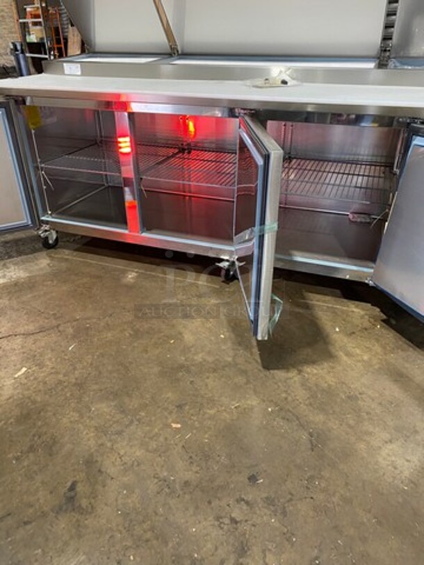 NICE! SCRATCH-N-DENT! Kelvinator Commercial Refrigerated Pizza Prep Table! With Commercial Cutting Board! With 3 Door Storage Space Underneath! All Stainless Steel! On Casters! Model: KCHPT9212 SN: 93610053 115V - Image 7 of 12