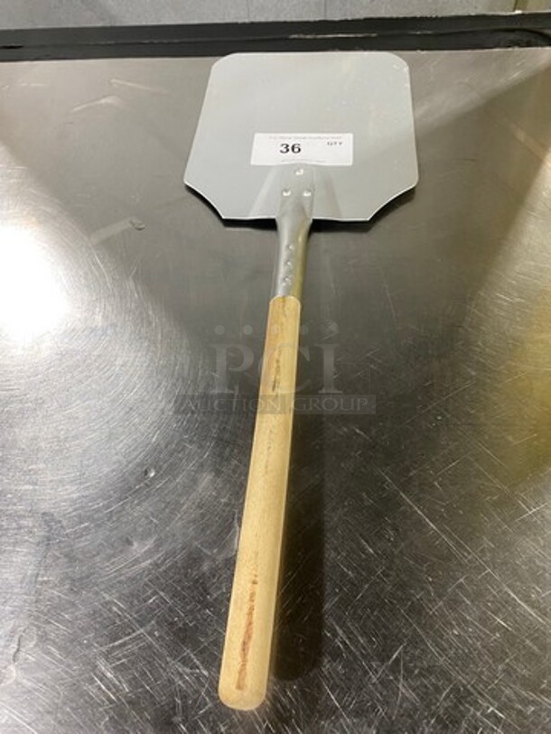 Pizza Paddle! Stainless Steel With Wooden Handle! - Image 1 of 3