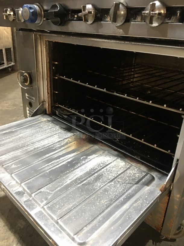 GREAT! Garland US Range Commercial Natural Gas Powered French Top/Hot Plate Stove! With Full Size Oven Underneath! With Metal Oven Racks! With Backsplash! All Stainless Steel! On Casters! - Image 7 of 9