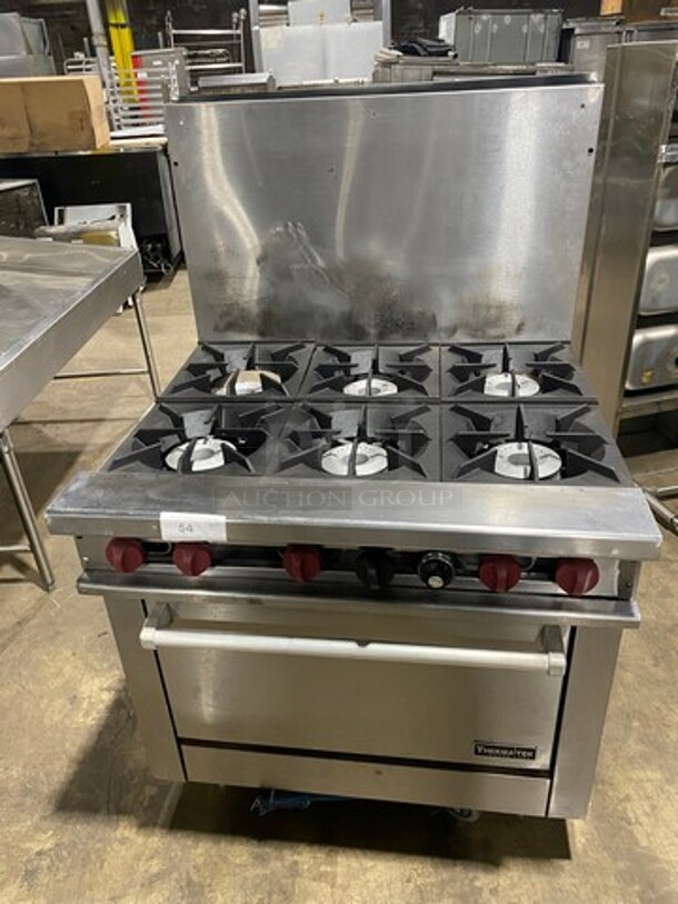 Therma Tek Natural Gas Powered 6 Burner Range! With Full Size Oven Underneath! With Raised Back Splash! On Commercial Casters!