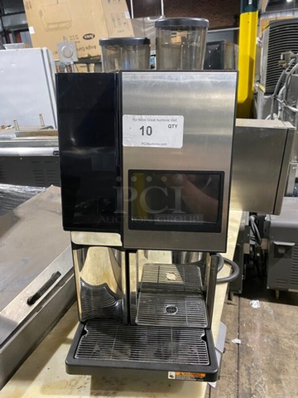 BEAUTIFUL! Bunn Commercial Countertop Automatic Espresso Machine! Touch Screen Settings! With 2 Coffee Bean Hopper! Stainless Steel Body! Model: SURETAMPAUTO SN: 1SPR003485 208V 60HZ 1 Phase - Image 1 of 12