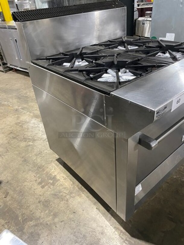 Garland Commercial Natural Gas Powered 4 Burner Stove! With Back Splash! With Oven Underneath! Metal Oven Rack! All Stainless Steel! On Casters! Model: M44R SN: 1601100100589 - Image 2 of 10