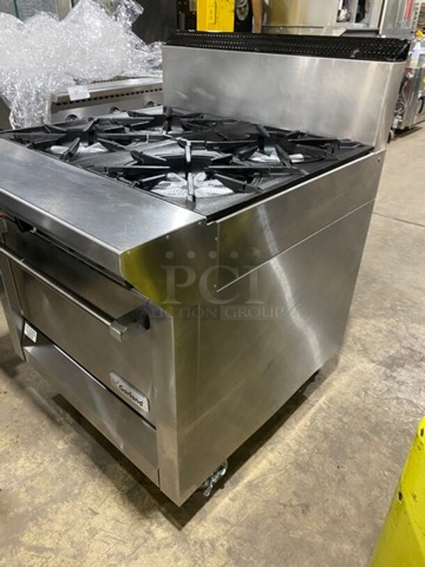 Garland Commercial Natural Gas Powered 4 Burner Stove! With Back Splash! With Oven Underneath! Metal Oven Rack! All Stainless Steel! On Casters! Model: 144R SN: 1601100100589 - Image 2 of 10