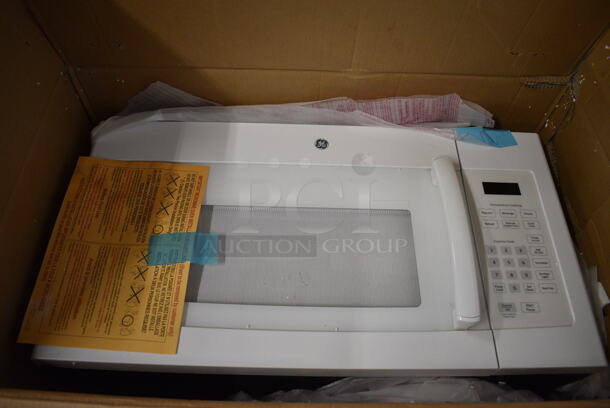 BRAND NEW IN BOX! General Electric Over The Range Microwave Oven. 31x18x18
