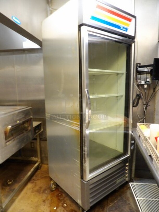 True Single (Glass) Door, Stainless, Upright, Reach-In Cooler. TESTED AND WORKING 

Model GDM-26-HC~TSL01. 

7'5"(H)x2'5.5"(W)x2'5"(D) - Image 1 of 6