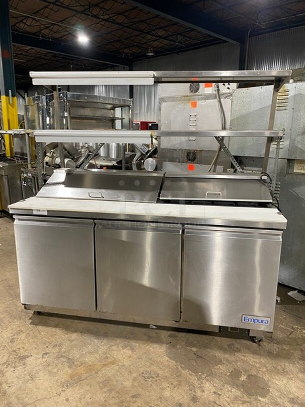SWEET! Empura Commercial Refrigerated Salad/Sandwich Prep Table! With 3 Door Underneath Storage Space! With Commercial Cutting Board! With Double Overhead Shelf & Ticket Holder! All Stainless Steel! Model EKSP72 Serial EKSP72R21251226! 115V 1Phase! On Casters! WORKING WHEN REMOVED! - Image 1 of 10
