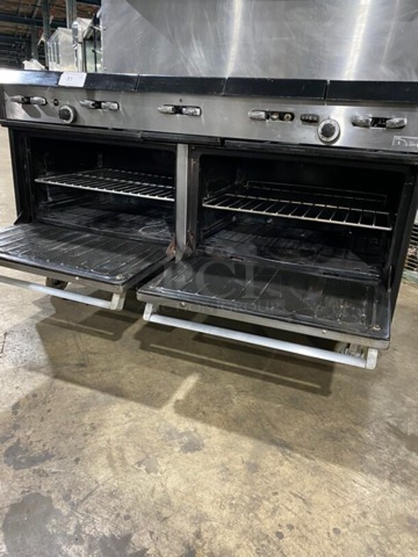AMAZING FIND! Garland Natural Gas Powered 10 Burner Stove! With 2 Full-Sized Ovens! With Metal Oven Racks! With Raised Back Splash & Salamander Shelf! Stainless Steel! On Casters! - Image 7 of 11