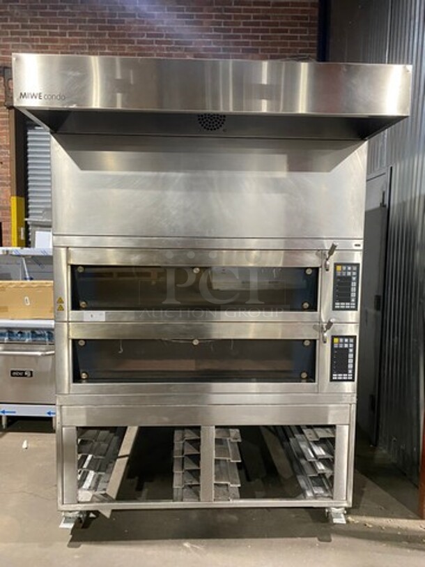 BEAUTIFUL! LATE MODEL! 2015 Miwe Commercial Electric Powered     Baking Center! With Exhaust Hood! With Steam Lines! With Digital And Button Controls! With Pan Rack Underneath! All Stainless Steel! On Casters! Model: C01212 SN: 705551002 208V 60HZ 3 Phase! Working When Removed!