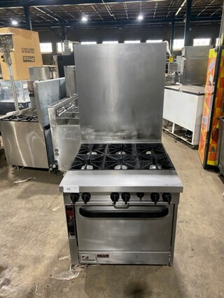 Southbend Heavy Duty Commercial Natural Gas Powered 6 Burner Stove! With Raised Back Splash! With Oven Underneath! All Stainless Steel! On Casters! Model: P32D-BBB SN: 05M09248!
