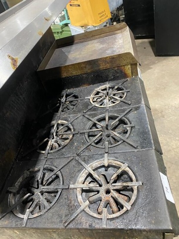 Garland Commercial Natural Gas Powered 6 Burner Stove With Right Side Flat Griddle! Griddle Has Side Splashes! With Raised Back Splash And Salamander Shelf! With 2 Oven Underneath! Metal Oven Racks! All Stainless Steel! On Legs! Working When Removed! - Image 5 of 9