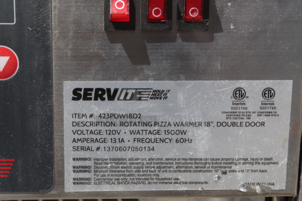 BRAND NEW SCRATCH & DENT! 	ServIt PDW18D2 18" Self-Service Pizza Warmer with 4-Shelf Rotating Rack	23 1/2x25 1/4x27 1/2 Inches		120 Volts, 12.5 Amps, 1 Phase. Glass Is Broken - Image 4 of 5