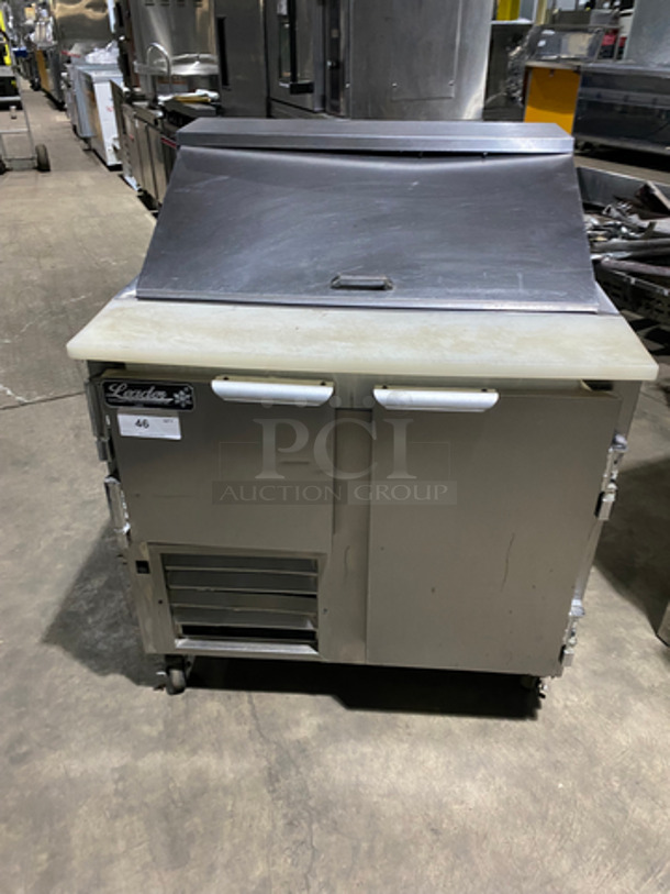 Leader Commercial Refrigerated Sandwich Prep Table! With 2 Door Underneath Storage Space! With Poly Coated Racks! With Commercial Cutting Board! All Stainless Steel! On Casters! Model: LM36 SN: PW08M1412 115V 60Hz 1 Phase - Image 1 of 10