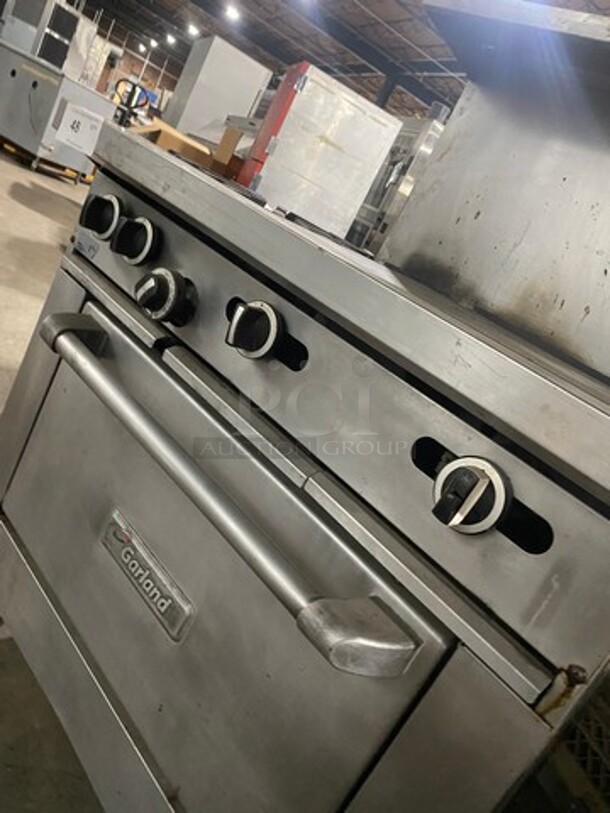 Garland Commercial Natural Gas Powered Hot Plate With Left Side 2 Burner Range! With Raised Splash Back And Salamander Shelf! With Oven Underneath! All Stainless Steel! On Legs! - Image 9 of 10
