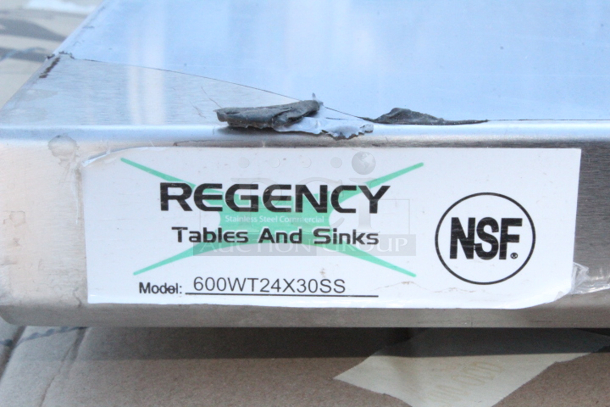 BRAND NEW SCRATCH & DENT! Regency 24" x 30" 16-Gauge 304 Stainless Steel Commercial Open Base Work Table. Out of Original Packaging.  - Image 3 of 4