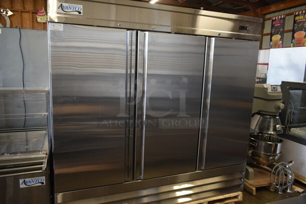 BRAND NEW SCRATCH AND DENT! 2023 Avantco 178SS3FHC Stainless Steel Commercial 3 Door Reach In Freezer w/ Poly Coated Racks and Commercial Casters. 115 Volts, 1 Phase. Stock Picture Used as Gallery. Tested and Working! - Image 4 of 12