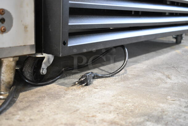BRAND NEW SCRATCH AND DENT! 2023 KoolMore MDR-2GD-35C Metal Commercial 2 Door Reach In Cooler Merchandiser w/ Poly Coated Racks on Commercial Casters. 115 Volts, 1 Phase. Tested and Powers On But Does Not Get Cold - Image 5 of 10
