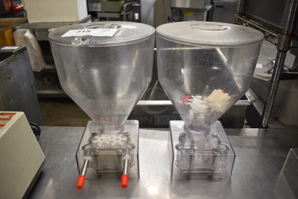 2 Poly Clear Pastry Donut Filler Hoppers. 1 w/ 2 Spouts. Goes GREAT w/ Lot # 314! 9x13x13.5. 2 Times Your Bid!
