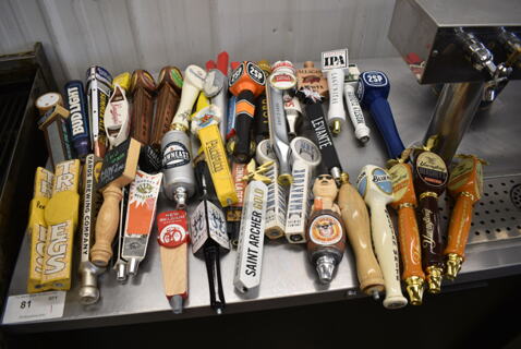 40 Various Beer Tap Handles Including Troegs, Allagash, Samuel Adams, Stella Artois, Blue Moon. 40 Times Your Bid!