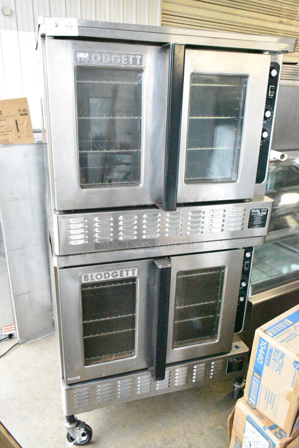 2 Blodgett Stainless Steel Commercial Propane Gas Powered Full Size Convection Oven w/ View Through Doors, Metal Oven Racks and Thermostatic Controls on Commercial Casters. 2 Times Your Bid!  - Image 1 of 9