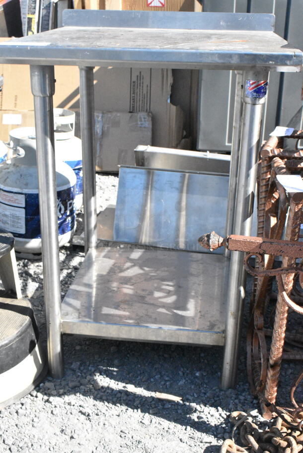 Stainless Steel Table w/ Back Splash and Under Shelf.  - Image 1 of 4