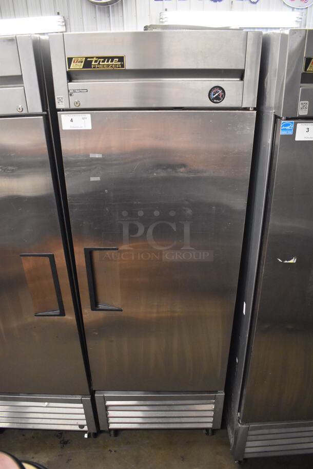2013 True T-23F ENERGY STAR Stainless Steel Commercial Single Door Reach In Freezer w/ Poly Coated Racks on Commercial Casters. 115 Volts, 1 Phase. 27x30x83.5. Tested and Working!