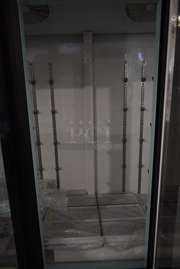BRAND NEW SCRATCH AND DENT! 2023 Avantco 178GDC69HCB Metal Commercial 3 Door Reach In Cooler Merchandiser w/ Poly Coated Racks. 115 Volts, 1 Phase. Stock Picture Used as Gallery. Tested and Working! - Image 7 of 9