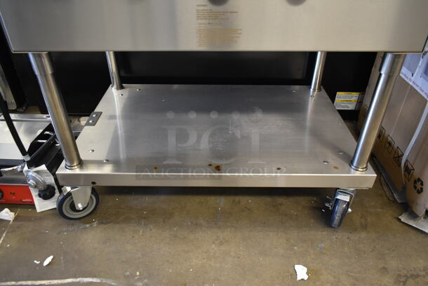 LIKE NEW! 2022 Backyard Pro 554LPG36 Stainless Steel Commercial Propane Gas Powered Outdoor Grill w/ Brick Oven Attachment and Under Shelf on Commercial Casters. Stock Picture Used as Gallery. Tested and Working! - Image 3 of 10
