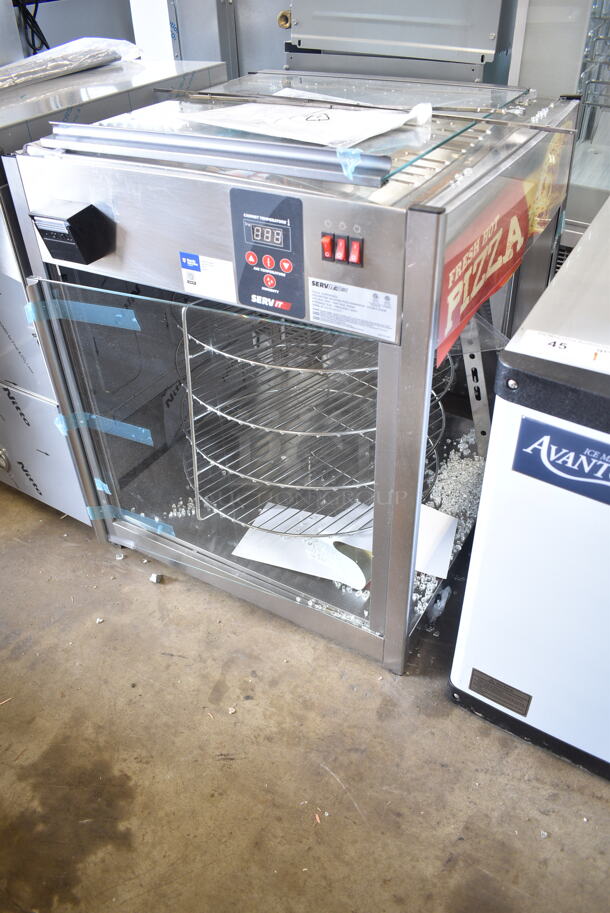 BRAND NEW SCRATCH AND DENT! ServIt 423PDW18D2 Stainless Steel Commercial Countertop Self-Service Pizza Warmer with 4-Shelf Rotating Rack. See Pictures for Broken Glass. 120 Volts, 1 Phase. Tested and Working! - Image 3 of 8