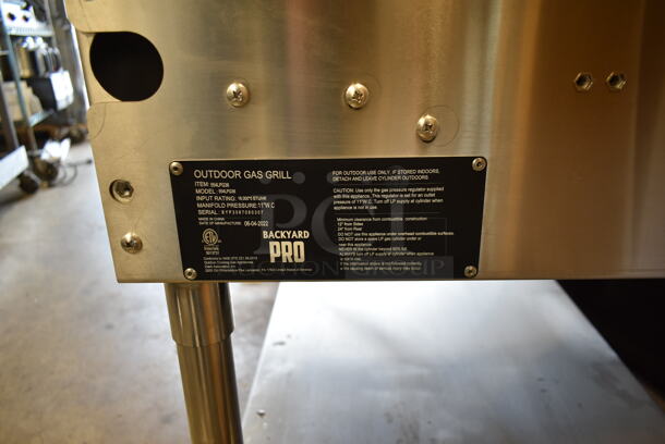 LIKE NEW! 2022 Backyard Pro 554LPG36 Stainless Steel Commercial Propane Gas Powered Outdoor Grill w/ Brick Oven Attachment and Under Shelf on Commercial Casters. Stock Picture Used as Gallery. Tested and Working! - Image 5 of 10