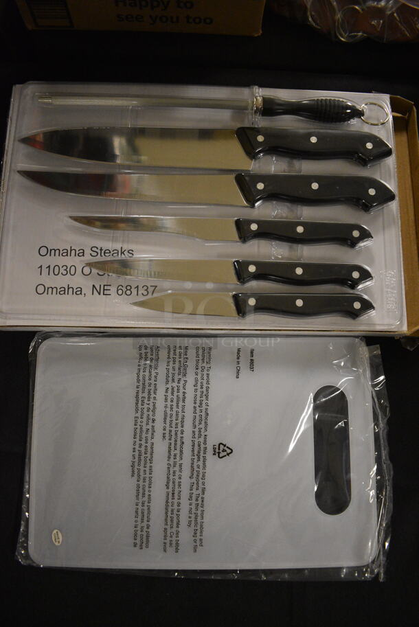 BRAND NEW IN BOX! Set of 5 BRAND NEW Stainless Steel Knives, 1 Knife Sharpening Rod and Cutting Board