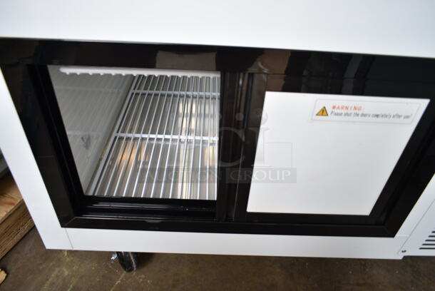 BRAND NEW SCRATCH AND DENT! 2023 Avantco 178DDLC50W Metal Commercial Floor Style 50" White Square Glass Refrigerated Deli Case. 115 Volts, 1 Phase. Tested and Working! - Image 6 of 9