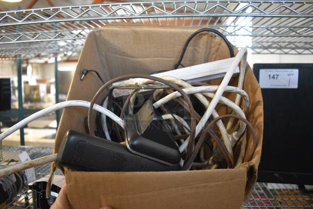 ALL ONE MONEY! Lot of Various Items Including Cords, Phone and Cradle - Image 1 of 3