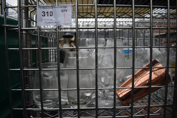 ALL ONE MONEY! Lot of Chrome Finish 5 Tier Shelving Unit on Commercial Casters w/ Liquor Cage and All Contents Including Glasses, White Ceramic Plates. BUYER MUST DISMANTLE. PCI CANNOT DISMANTLE FOR SHIPPING. PLEASE CONSIDER FREIGHT CHARGES. 38x25x68 - Image 5 of 10