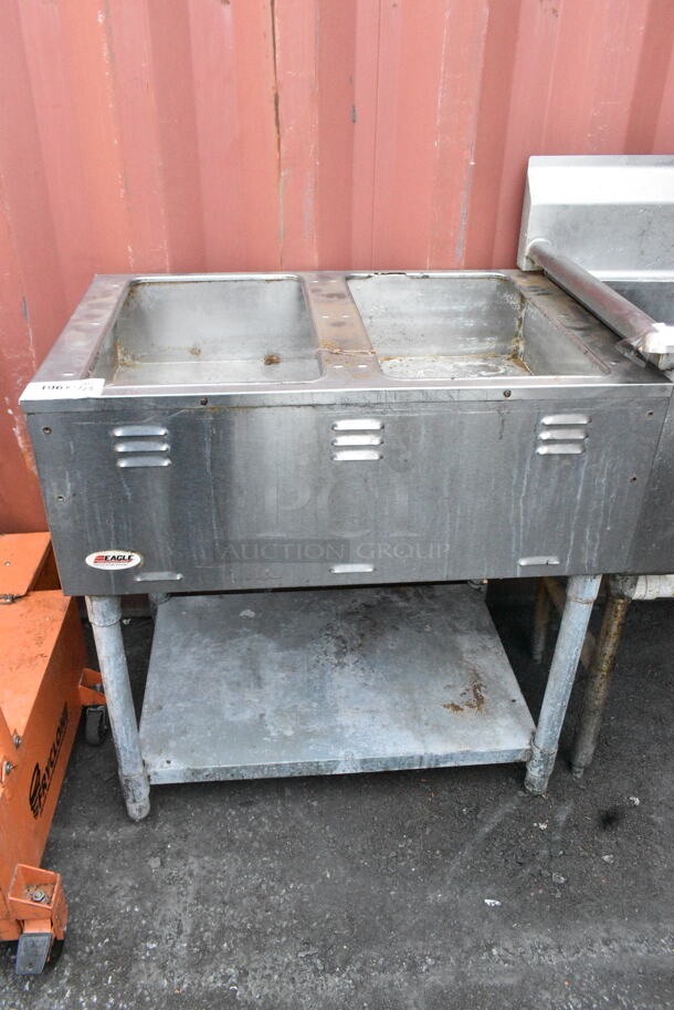 Eagle AWT2-NG Stainless Steel Commercial Gas Powered 2 Bay Steam Table w/ Under Shelf. 15,000 BTU.  - Image 1 of 7