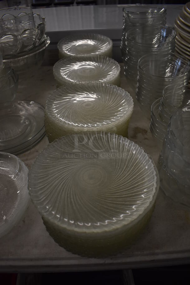 ALL ONE MONEY! Lot of Items on Tabletop Including Glass Plates, Ceramic Plates and Pitchers - Image 4 of 9