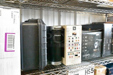 7 Various Items Including iRobot Roomba 692 Vacuum, Koah Hard Case, 2 Keurig Single Cup Coffee Machine, Nespresso Single Cup Espresso Machine, Chefwave Espresso Machine. 7 Times Your Bid! 