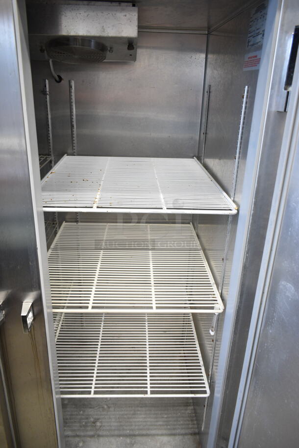 2021 Continental 2F Stainless Steel Commercial 2 Door Reach In Freezer w/ Poly Coated Racks on Commercial Casters. 115 Volts, 1 Phase. Tested and Does Not Power On. Appears to Need to be Rewired and a New Power Cord - Image 4 of 6