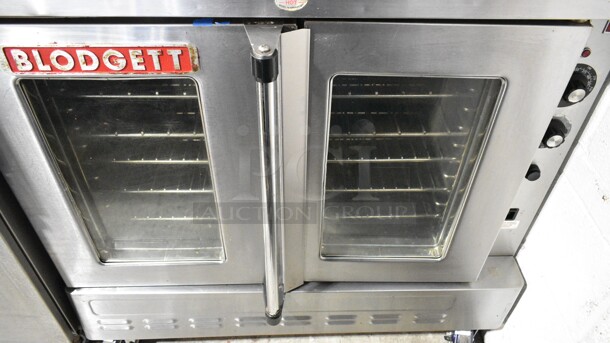 2 Blodgett Stainless Steel Commercial Gas Powered Full Size Convection Oven w/ View Through Doors, Metal Oven Racks and Thermostatic Controls on Commercial Casters. 2 Times Your Bid!  - Image 4 of 11