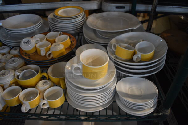 ALL ONE MONEY! Metro Lot of 5 Tiers of Various Items Including Poly Bin, Cutting Boards, Mugs, Plates and Saucers. Does Not Include Metro Shelving Unit - Image 6 of 11