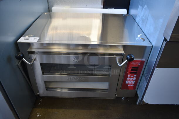 BRAND NEW SCRATCH AND DENT! Avantco 177DDPO18DSM Stainless Steel Commercial Countertop Electric Powered Pizza Oven w/ Cooking Stones. 240 Volts, 1 Phase. - Image 1 of 8